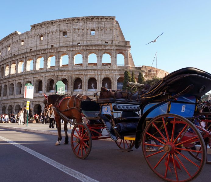 Colosseum with a Botticelle horse-drawn carriage in the foreground
