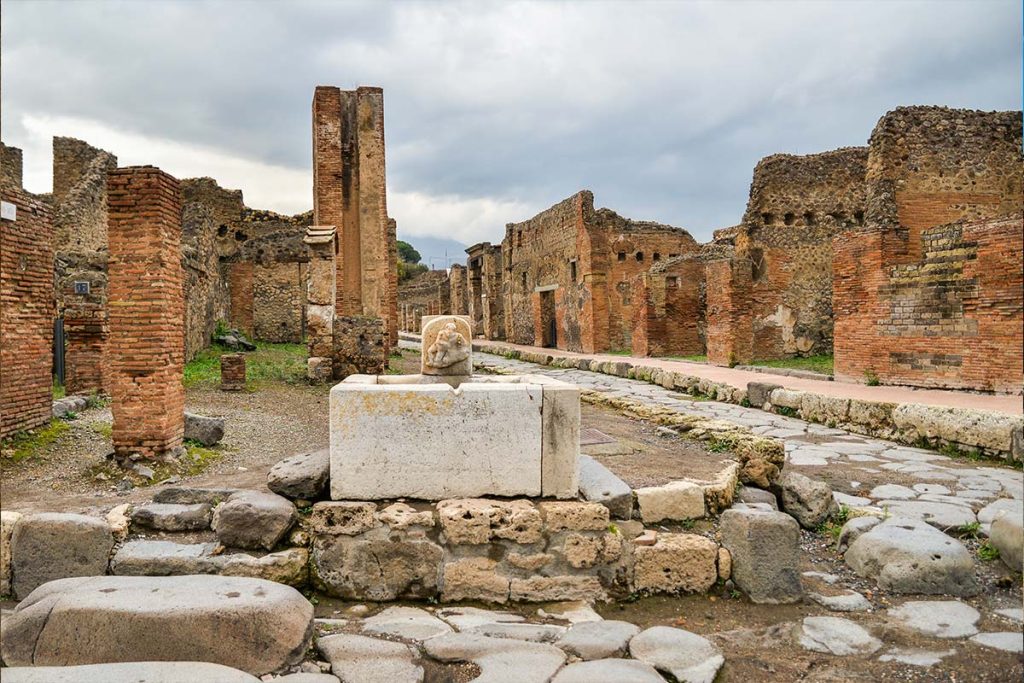 Stone fountain in Pompeii archeological site